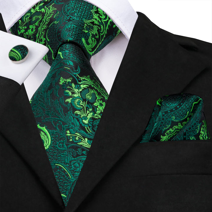 Green floral tie with mens black suit