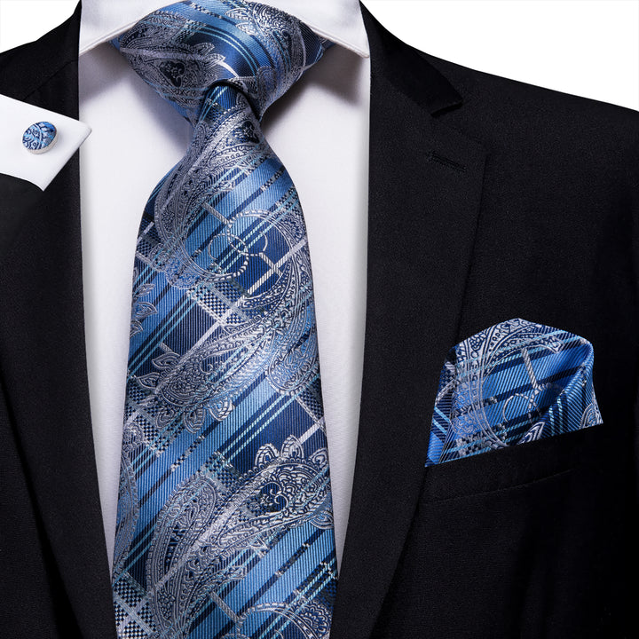 mens black suits and ties of blue grey paisley