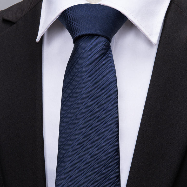 striped navy blue skinny tie