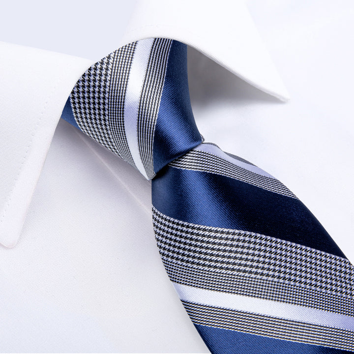 white shirt blue black white striped business tie